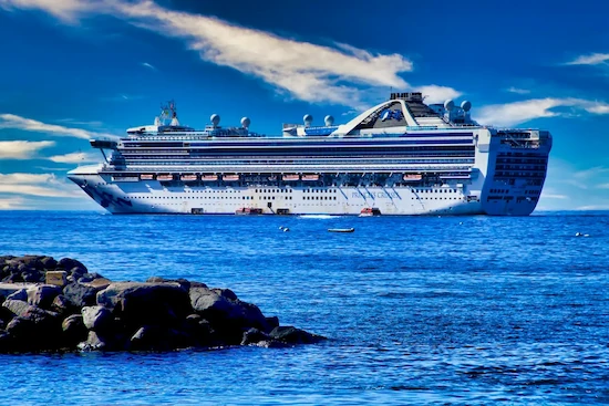 Large cruise ship view in open water.